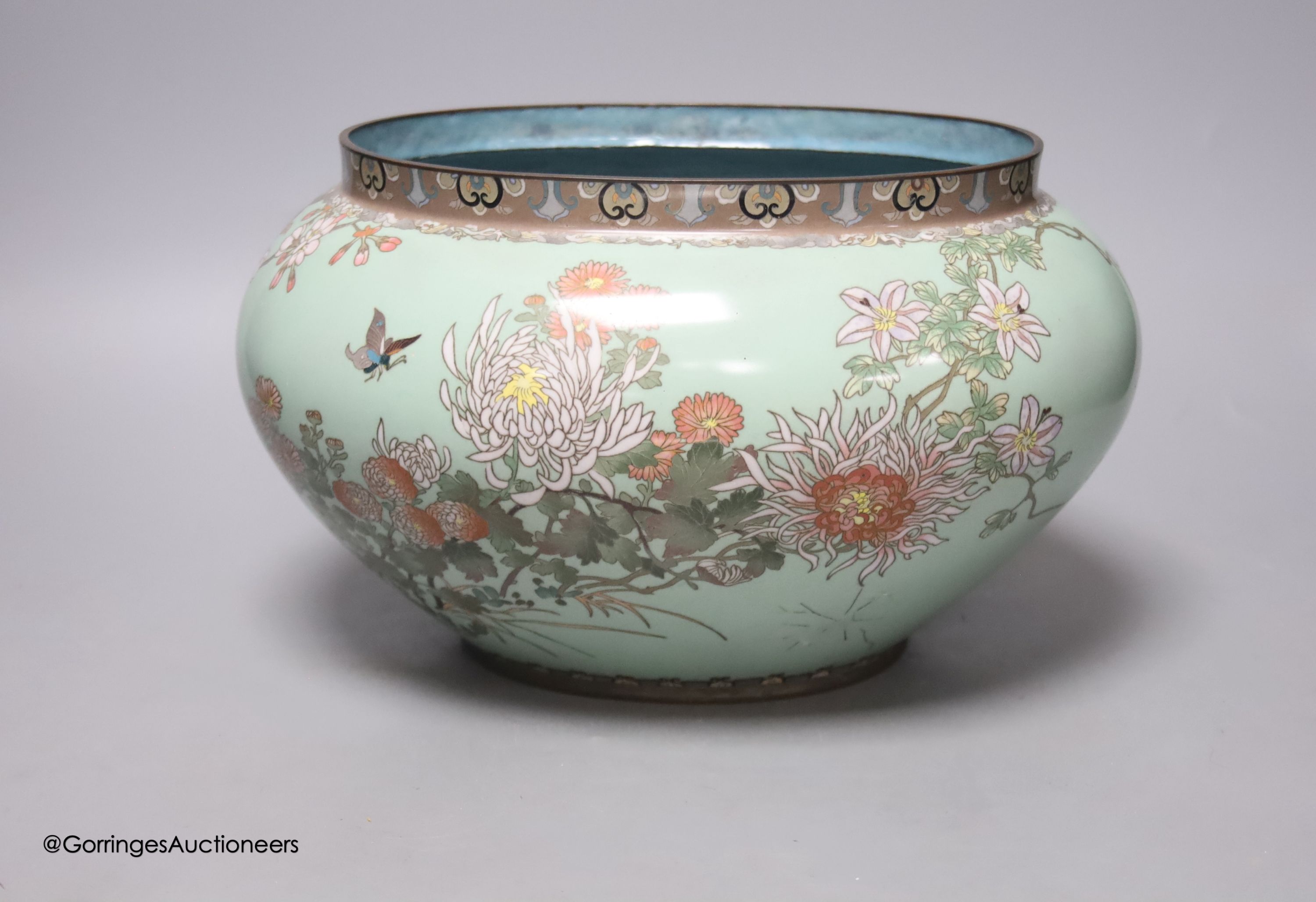 A large Japanese blue ground cloisonne bowl, height 19cm, 28cm wide